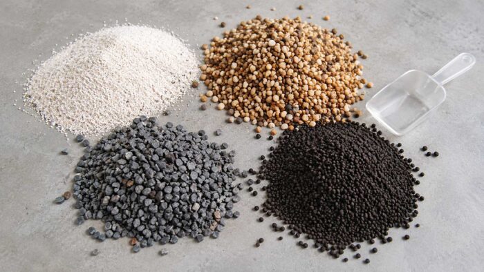 Four aquarium substrates compared side by side: white sand, natural gravel, grey gravel and dark aquasoil